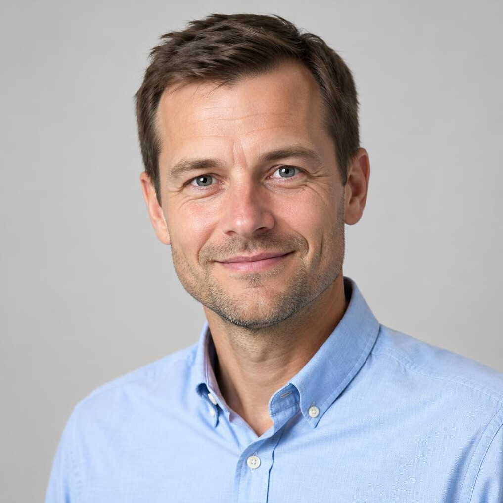 Portrait of a man in a shirt with a friendly expression