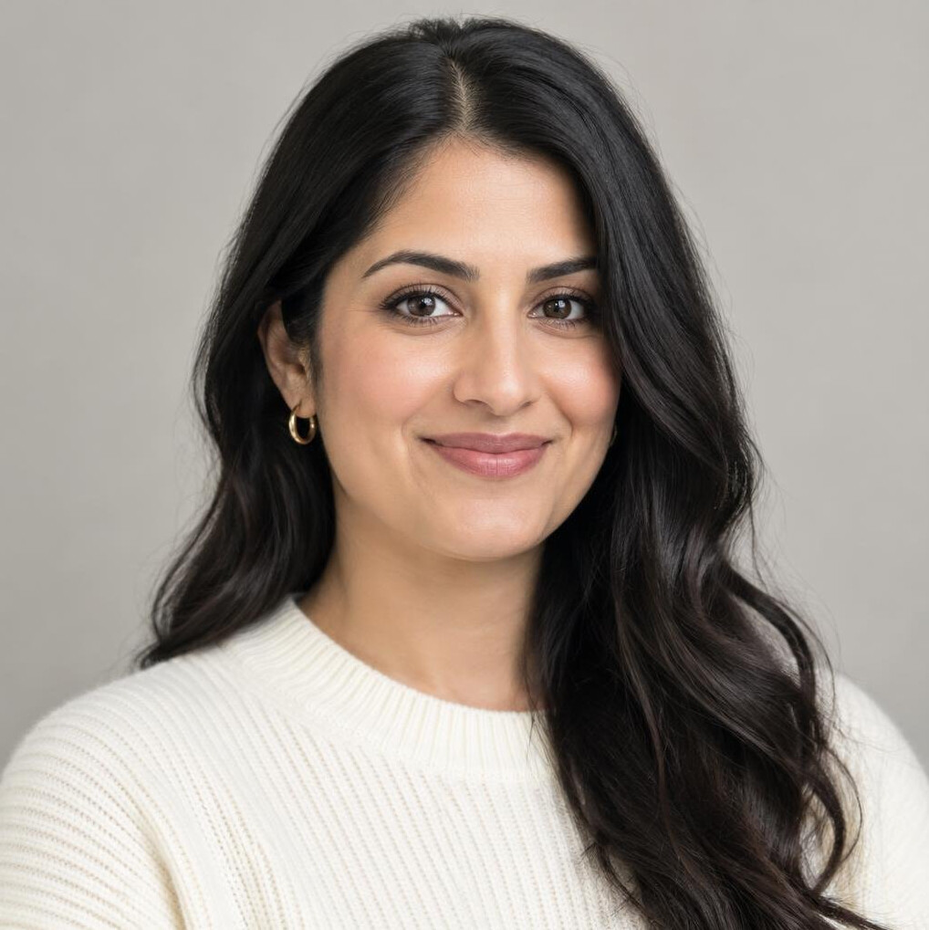Portrait of a woman with dark hair smiling